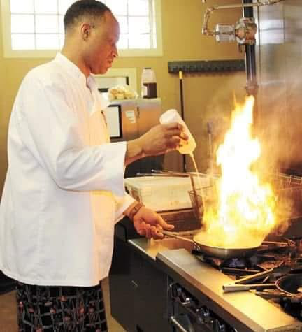 Gerald DeBerry at work in a professional kitchen